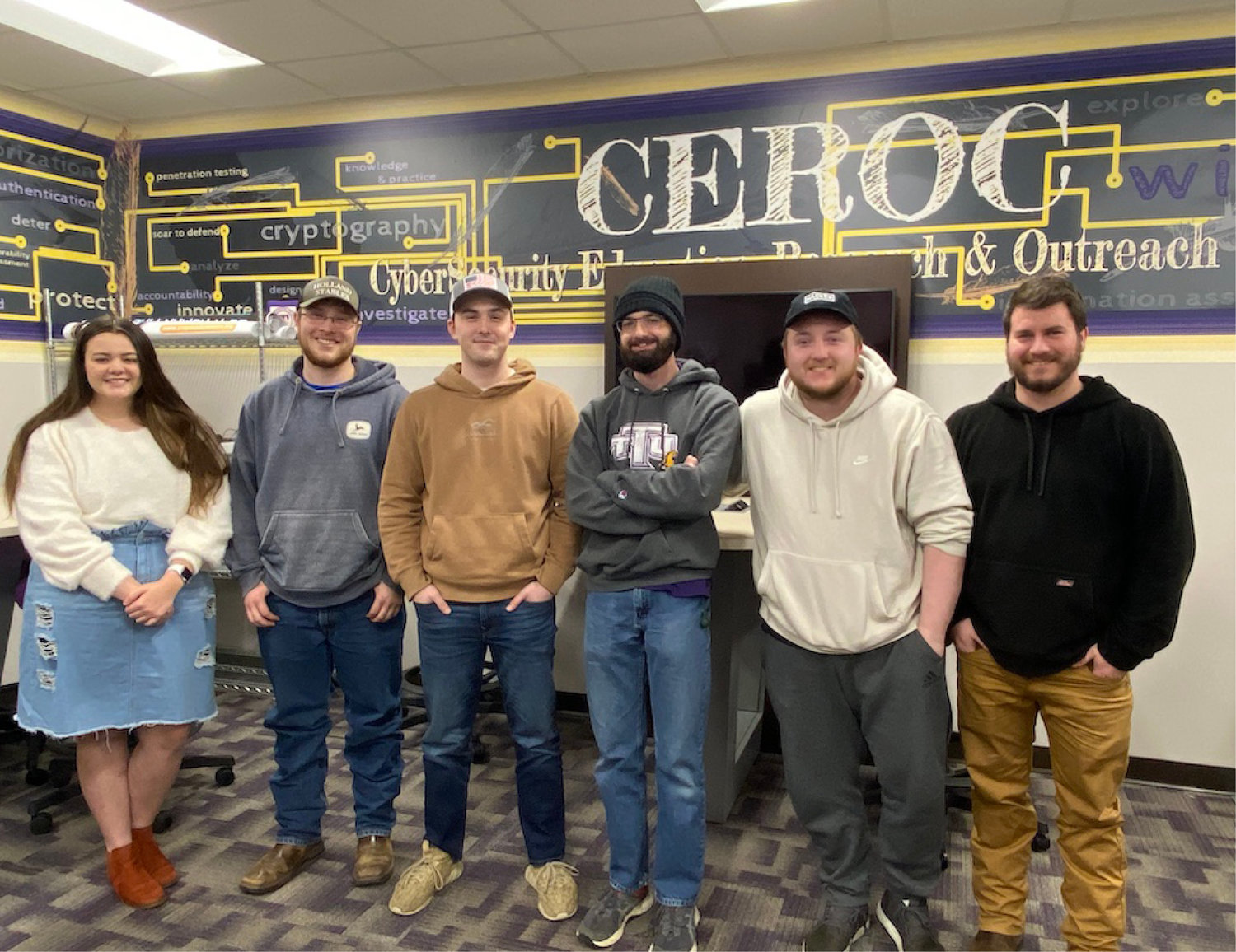 Cybersecurity Team members, from left, are Kaitlyn Carroll, Jesse Holland, Austin Brown, Jacob Sweeten, Austin Tice and Coach Travis Lee. Not pictured is team member John Housley.